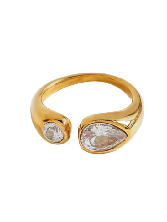 Gold ring with two clear gemstones
