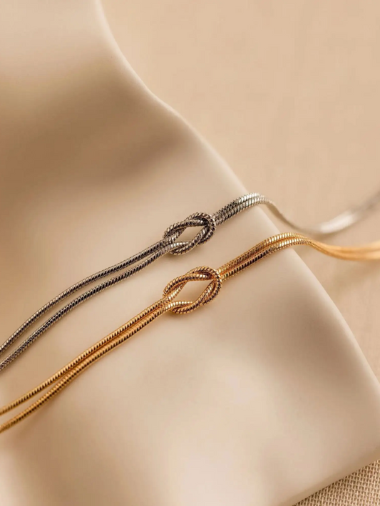 Two gold and silver bracelets