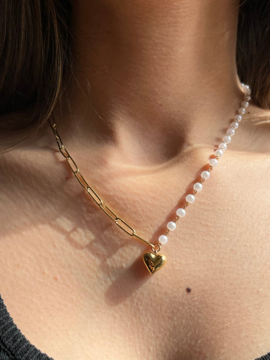 Pearl necklace with a gold heart pendant