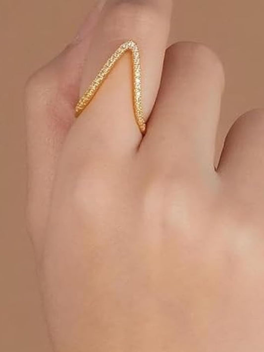 Gold ring with embedded stones