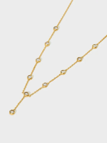 Gold necklace with small round beads 
