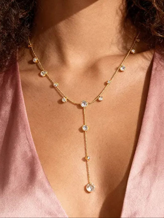 Gold necklace with small stones