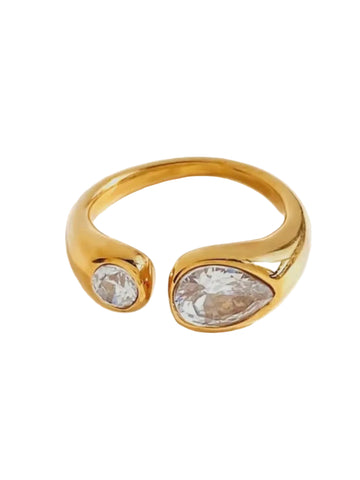 Gold ring with two clear gemstones