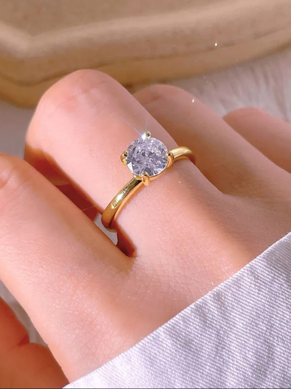 Gold ring with a diamond