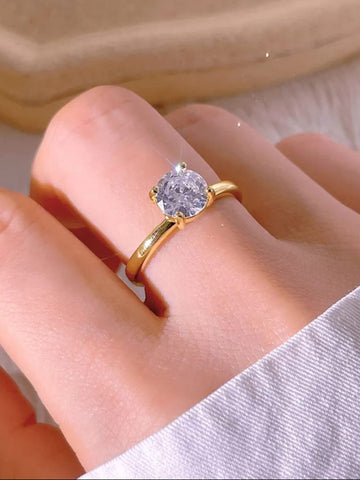 Gold ring with a diamond
