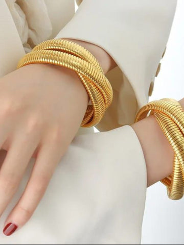 Chunky Gold Coil bangle QROSH