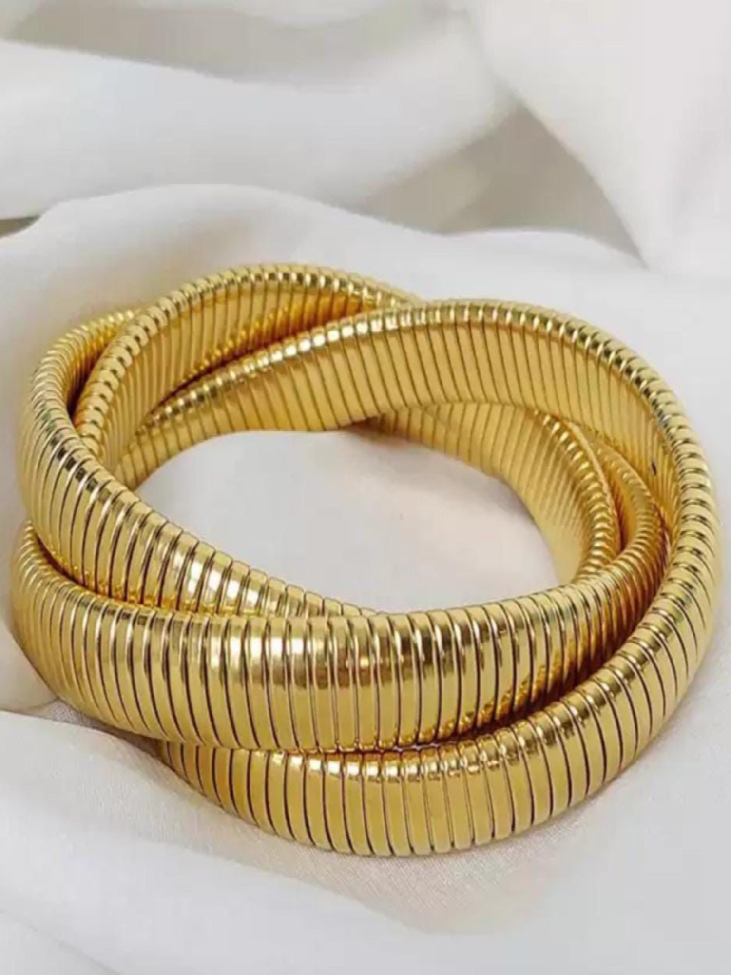 Chunky Gold Coil bangle QROSH