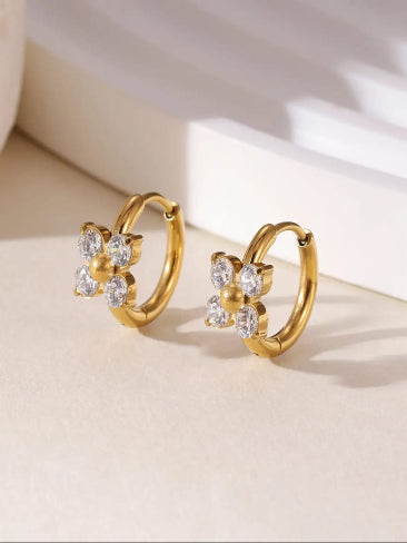 Gold hoop earrings with diamond accents