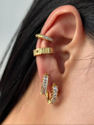 Gold earrings with gemstones