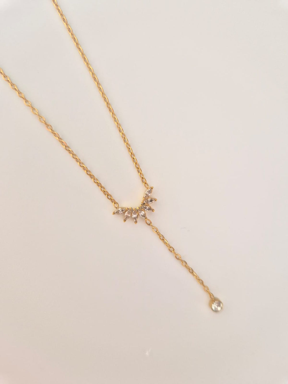 Gold necklace with a delicate pendant