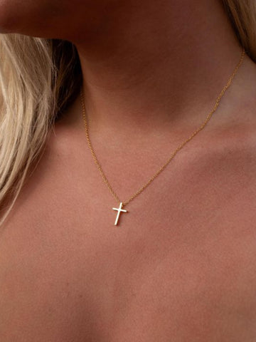 Gold necklace with a cross pendant 