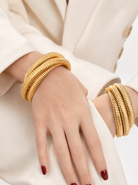 Chunky Gold Coil bangle QROSH