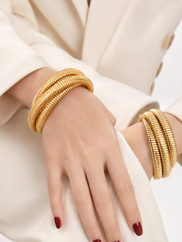 Chunky Gold Coil bangle QROSH