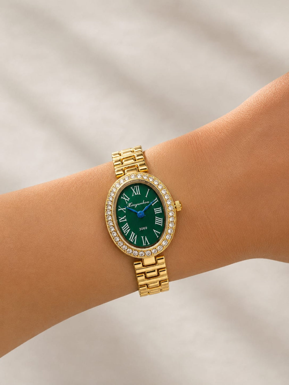 Crystal Bezel Oval Gold Watch QROSH