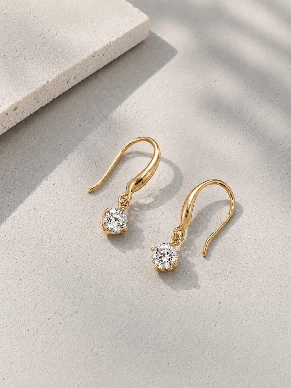 QROSH 18K gold hook drop earrings in anti-tarnish jewelry style, showcasing elegant dangling design on a plain background.